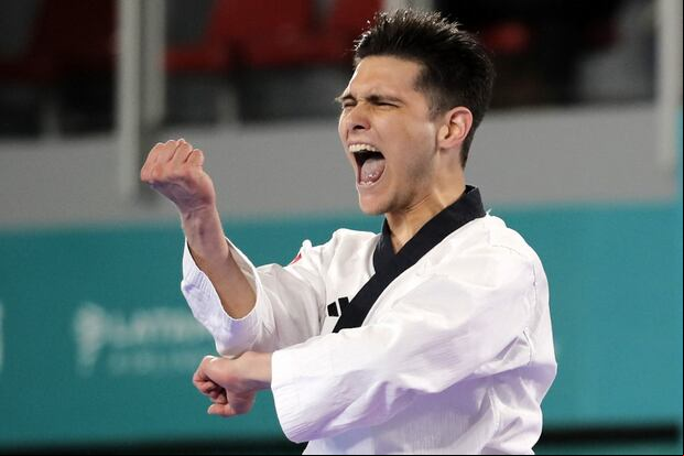 Hugo del Castillo ganó la medalla de bronce en Taekwondo Poomsae en Santiago 2023. (Foto: AFP)